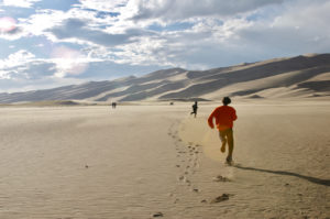 Running across the sand flats