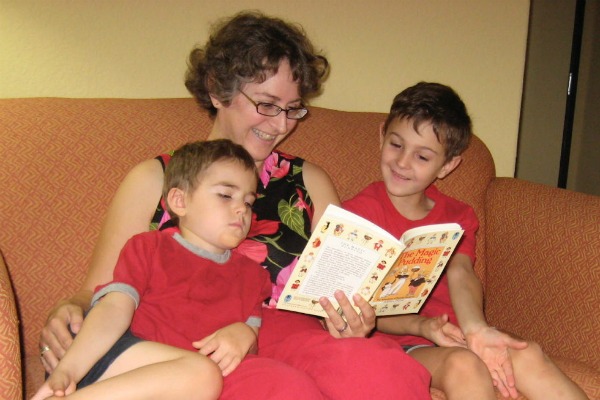 Kathy reading to two boys